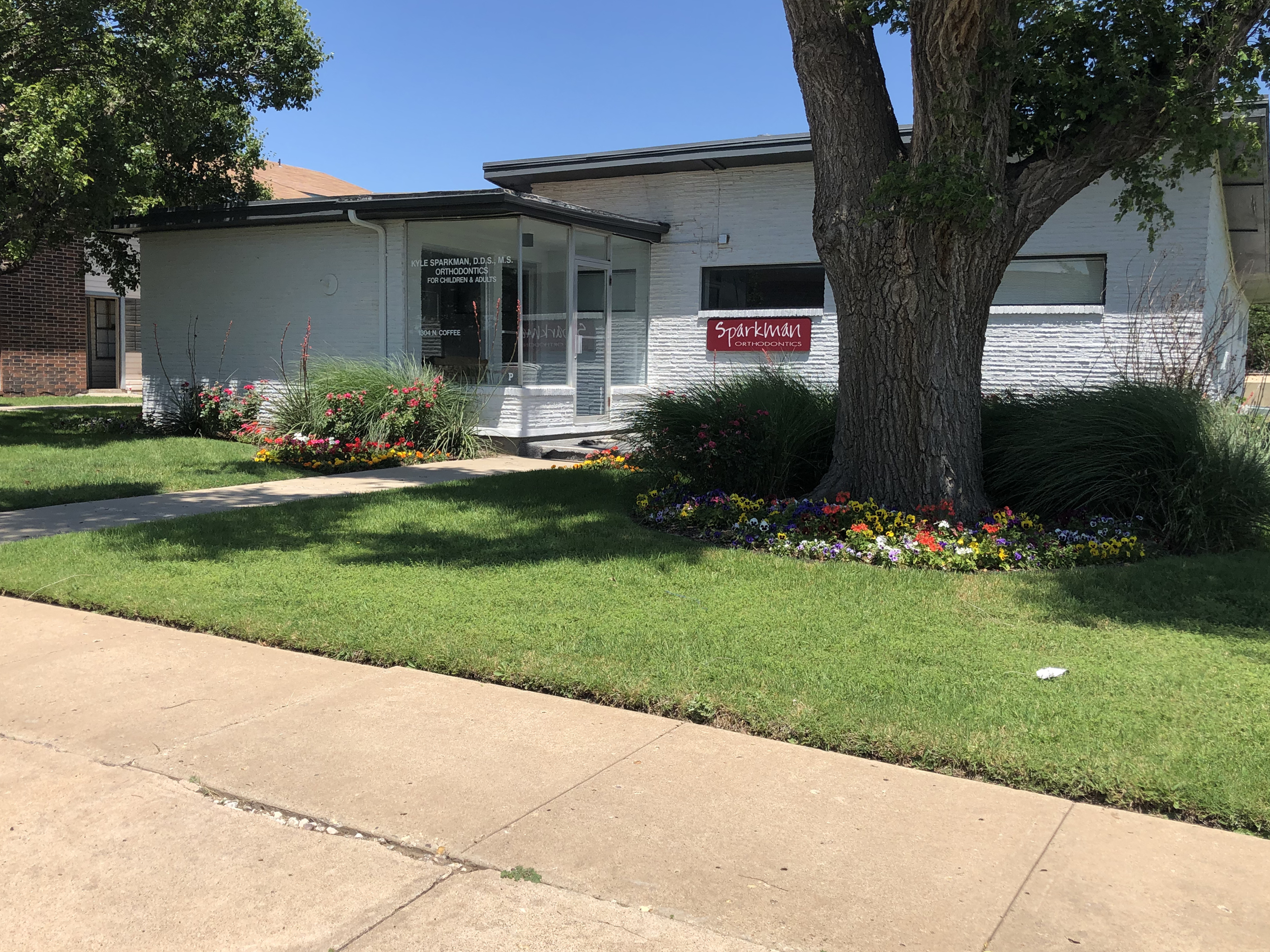 Landscaped garden with lush green plants and decorative stones